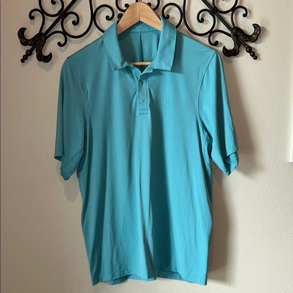 LULULEMON MENS SNAP FRONT POLO SHORT SLEEVE BLUE